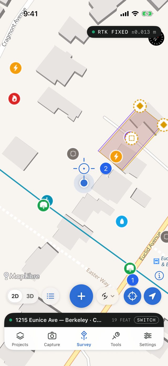 The Survey map with manual placement on: a blue crosshair in the middle of the map, just above the blue position dot, and the crosshair button shown blue in the control row
