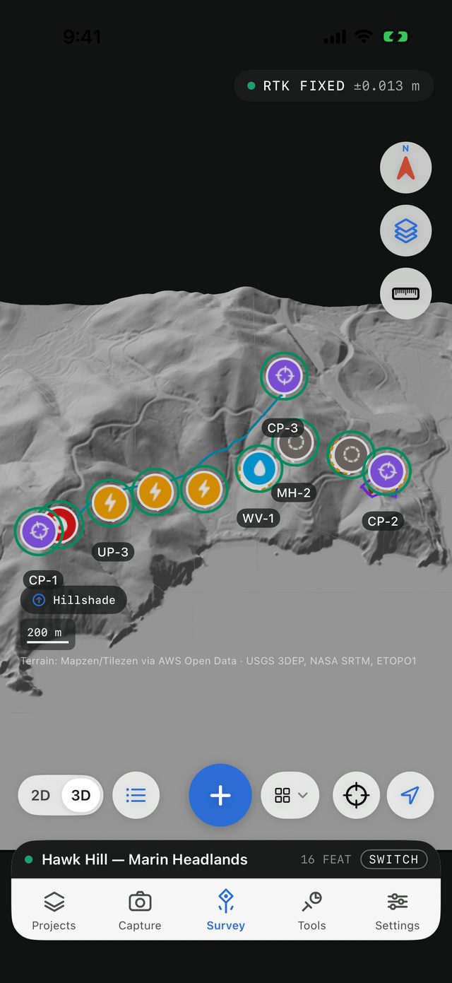 The 3D site model of Hawk Hill with the Hillshade surface: grey shaded relief under the pins and a route, and the pill at the bottom left reading Hillshade